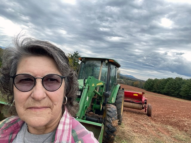 Cathy cultivates a field on the farm after mitral valve repair surgery.